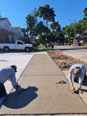 New Sidewalk , Did the big concrete slab next to it as well as their porch & driveway.