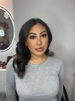 A beautiful, loose curl blowout, and a glam make up beat