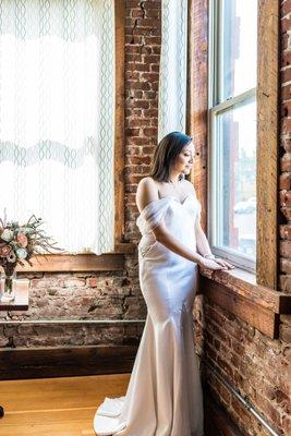 simple vintage inspired white wedding dress, draped wedding dress, with tulle wrapped sleeves and sheer cut outs