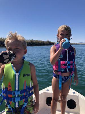 Kids enjoying their koozies.