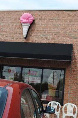 no sign, just a pink ice cream cone