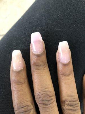 Was supposed to be pink and while ombre. Had middle finger repaired and this is what I got. Clearly not ombre.