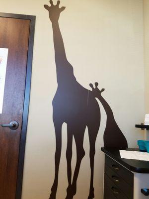 Cute animals on the walls. A very kid friendly office.