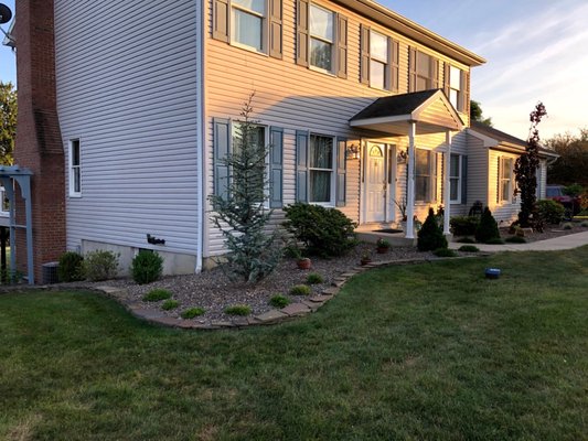 All new shrubbery , border and stone