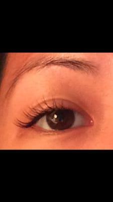 These are the natural-looking, full set lashes with a D curl almost 2 weeks after I got them done.