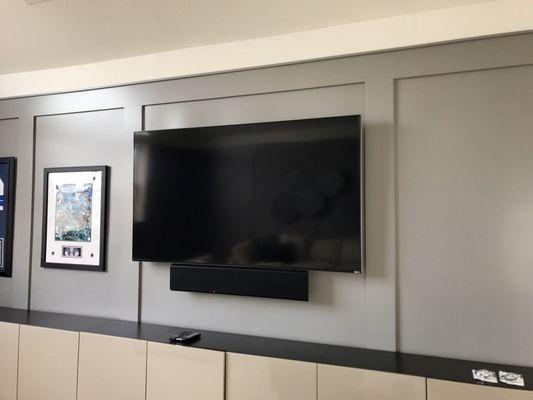 75"Tv wall mounted with Yamaha Soundbar