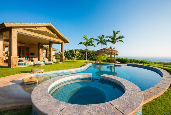 Serenity by the water. This pool is calling for a perfect day of relaxation and sunshine.