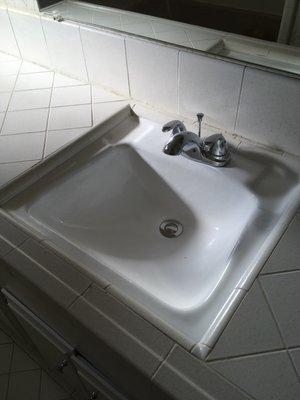 This sink had horrible rust damage too!  You can't tell at all, it looks new!