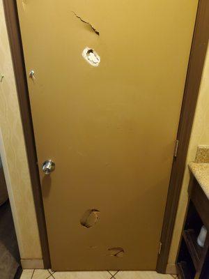 Damaged bathroom door