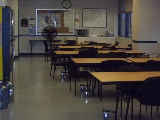 This is a break room that ALTRO  maintains at a high standard of cleanliness for employees of a 24/7 transportation shop. 