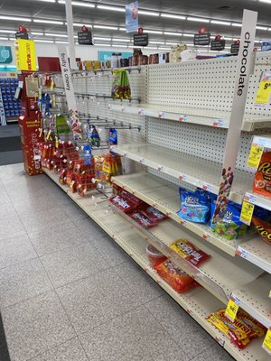 Another view of almost bare candy aisle across from front checkout on 11/14/21.