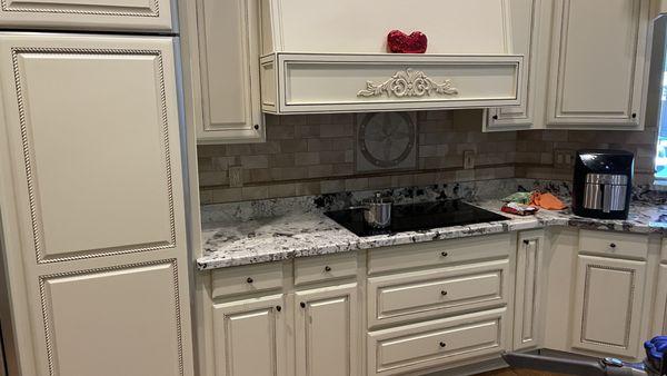 Old glazed paint on refrigerator door on left, new paint and glaze on right.  Indistinguishable.