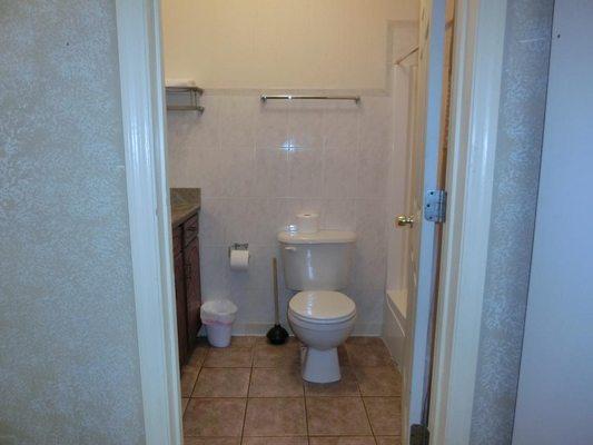 Tile floor bathroom. handicap accessible too!