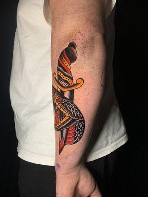 Traditional snake and dagger piece