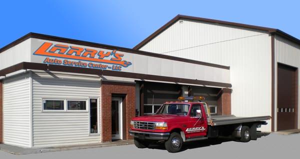 An outdoor view of Larry's Auto Service Center on a sunny day in Bethlehem, PA