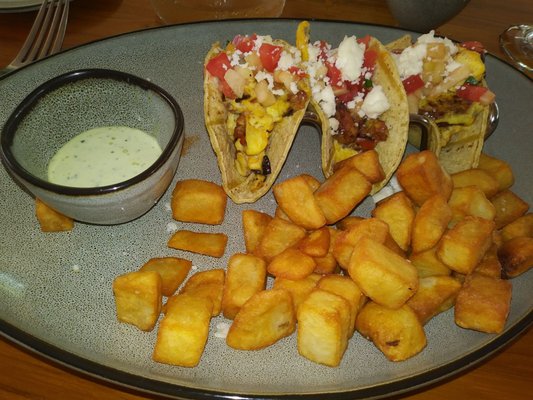 Chorizo and egg tacos with breakfast potatoes