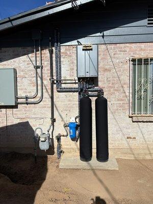 Whole house water conditioner and tankless water heater.