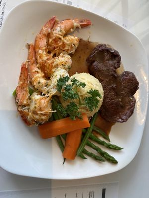 Petite Filet with bordelaise sauce and garlic, herb and Romano cheese crusted Shrimp