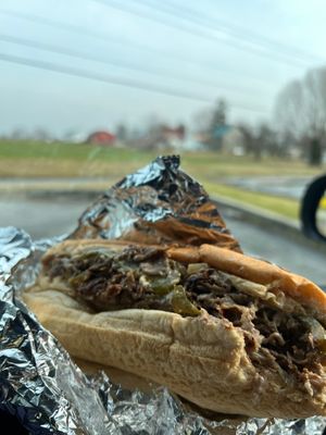 Wheat bread Philly cheesesteak with melted cheese