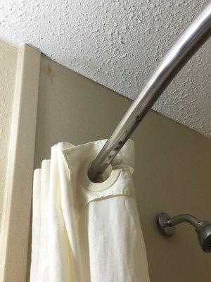 Stains & rusted shower curtain rail