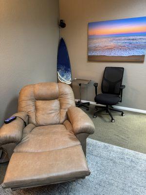 Relax in this comfortable automatic recliner that has countless positions available.