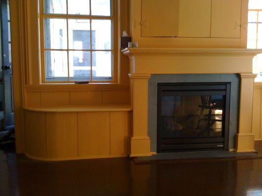 Installed Fireplace with custom surround and side bench