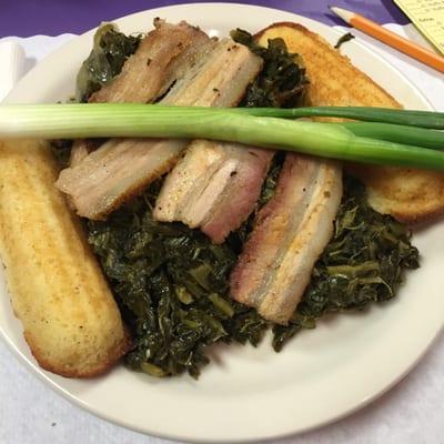 Greens, pick belly and cornbread.