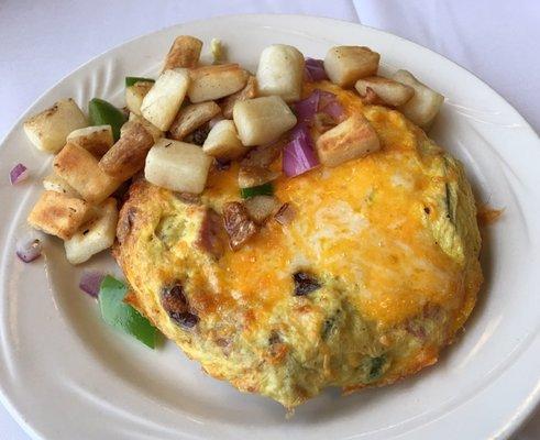 Pro Am Scramble (everything scramble) w/house potatoes and sourdough toast!