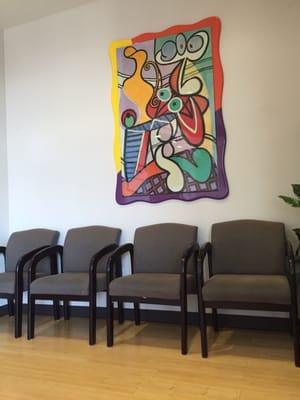 Seating and art in waiting room