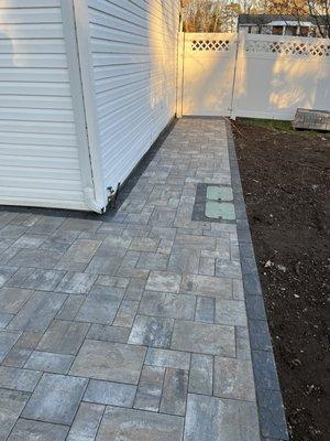 New patio encapsulating existing irrigation control box