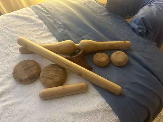 Bamboo tools that are heated to give a warm, soothing massage to melt away stress and tension.