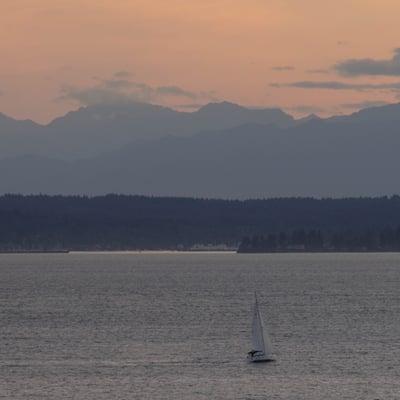 A sailboat over the Puget Sound