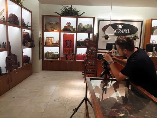 Photographing a client store in The Woodlands Mall.