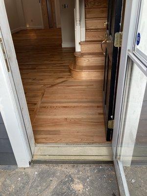 An excellent floor refinish, and a completely rebuilt staircase.