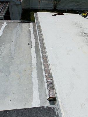 Flat metal roof repairs.