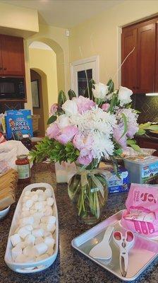 Simple bouquet of peonies, roses and spider flowers delivered in corona, Ca