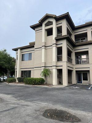 Exterior of building offering plenty of parking