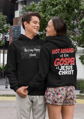 Christian Unisex Hoodies with "Not Ashamed of the Gospel of Jesus Christ" printed on the back.