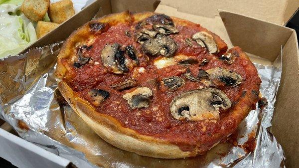 Lunch special.  Personal pepperoni and mushroom deep dish pizza and salad with blue cheese dressing.