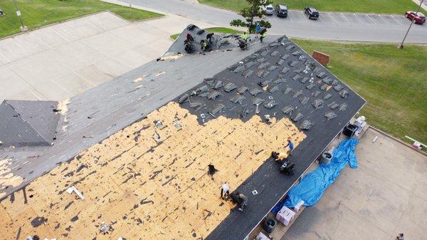 Tear off existing roof to the deck.