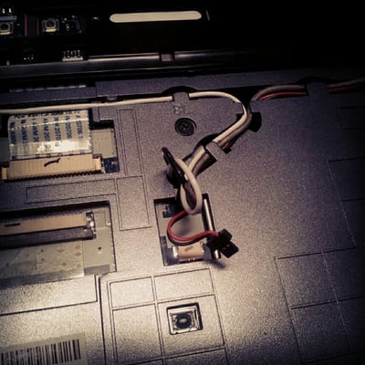 Nice and clean rewiring for a disassembled laptop.