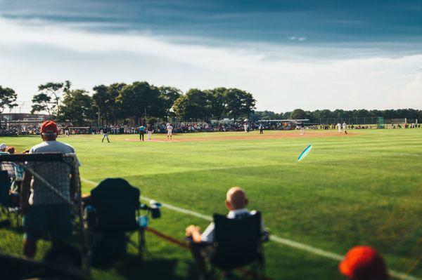 Fans look on as the Y-D Red Sox play in a 2016 CCBL Championship Game.