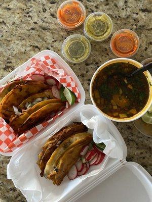 2 beef and 2 goat quesa birria's along with a medium side of consume and all three salsas.