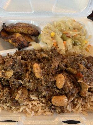 Ox tail, rice, peas, cabbage and fried plantains