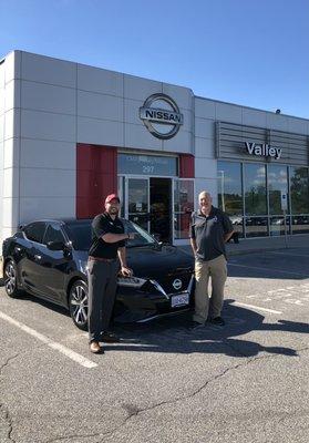 Jerry with his Certified Pre Owned 2019 Nissan Maxima