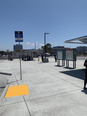 Lax Shuttle Stop at Bay 12.