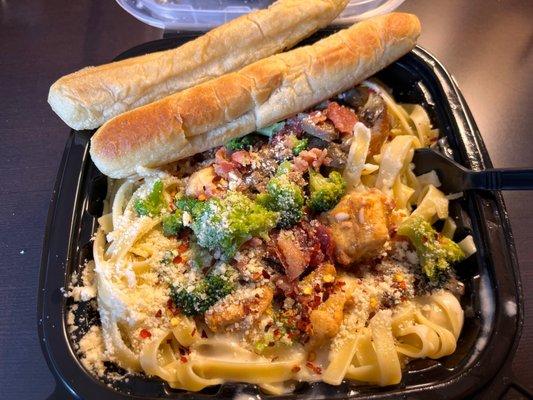 Loaded Fettuccine! Chicken, bacon, broccoli & mushrooms! Parm cheese and red pepper flakes were added after pick up.