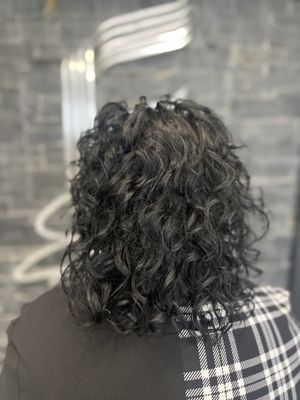 Dry curly cutting and hair bath and style