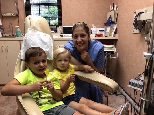 Our amazing dental hygienist treating her beautiful children!! Rachel is caring extremely thorough and gentle.