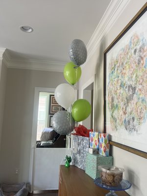 Paid for 6 green and white balloons!